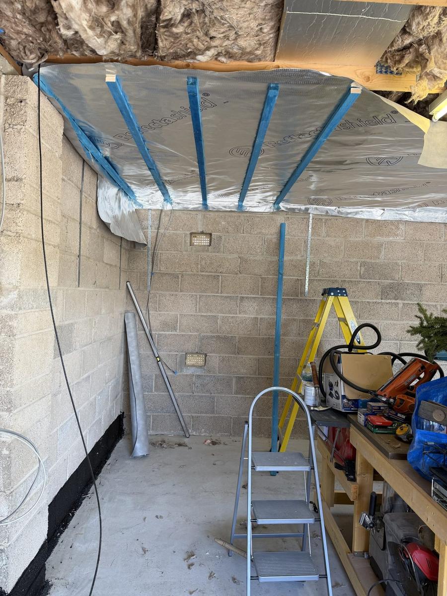 Foil vapour layer and battens going up on a garage ceiling, Dunfermline