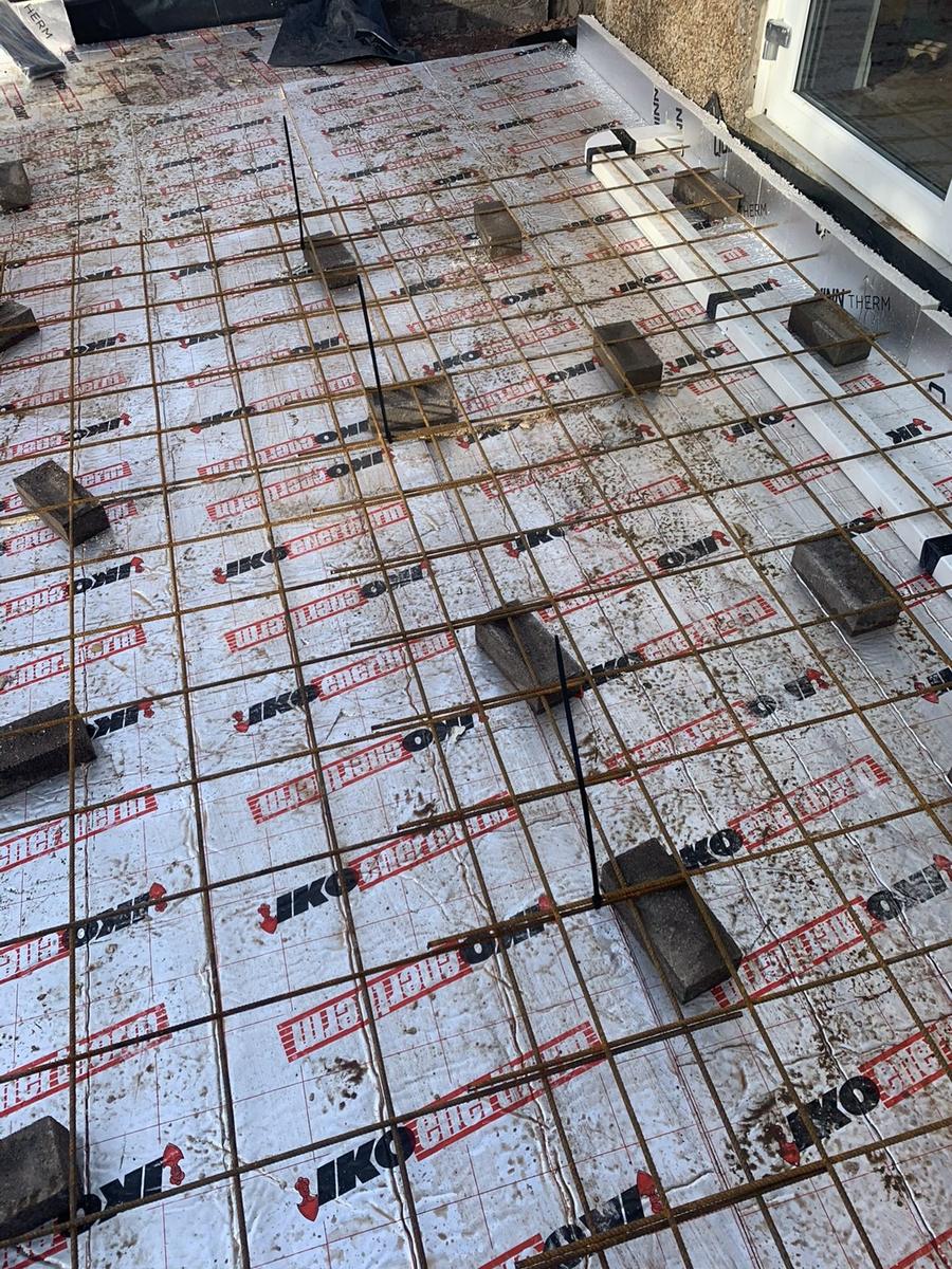 PIR insulation boards laid under the floor slab with reinforcing mesh, The Grange, Edinburgh