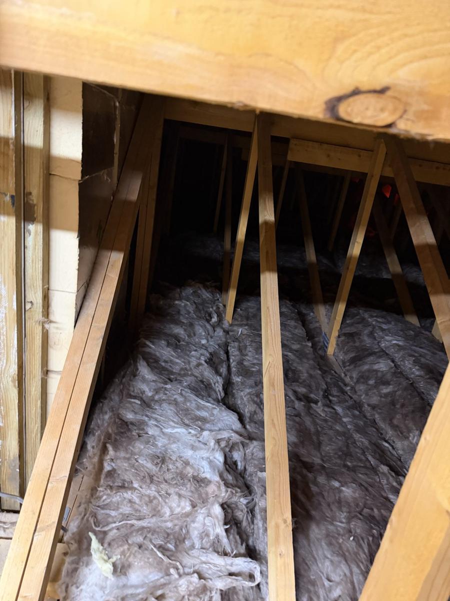 Second layer of Earthwool laid across the ceiling ties, Inverness