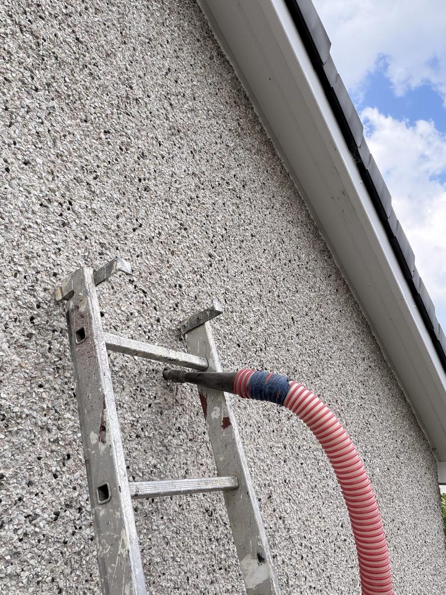 Injection nozzle in a drilled hole in the roughcast wall, Nairn