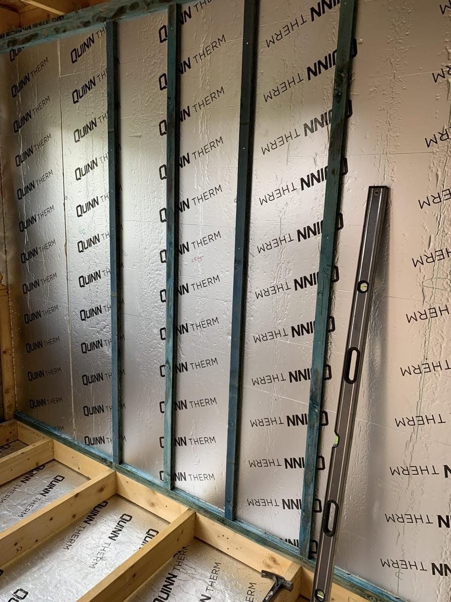PIR boards on the wall with service battens fixed over, St Andrews