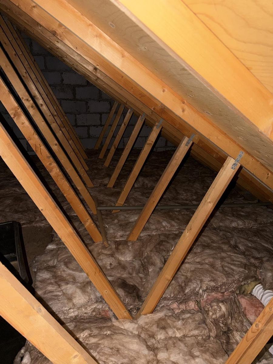 New Earthwool laid over older pink insulation in a Stirling loft