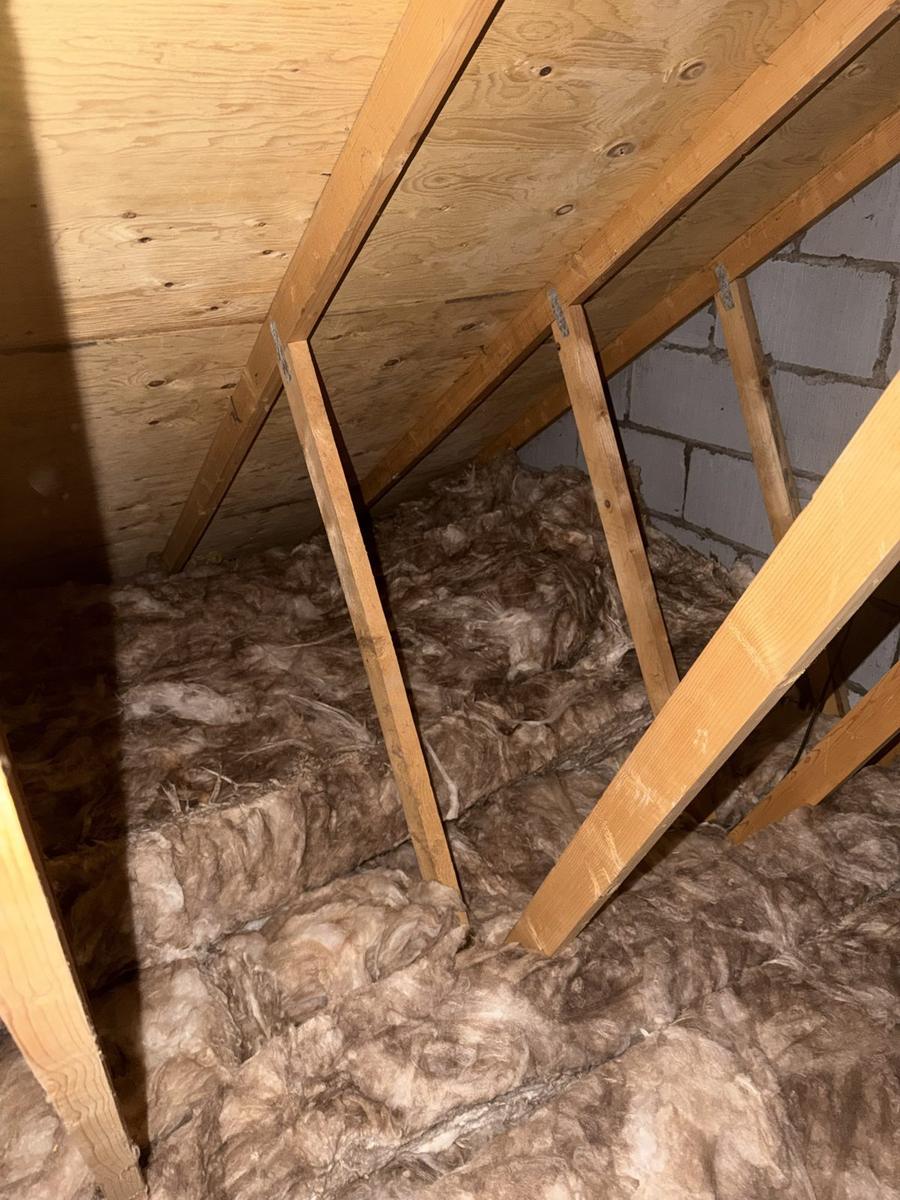 Loft insulation laid right into the eaves and against the gable wall, Stirling